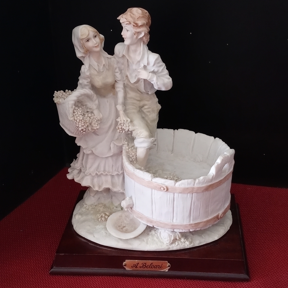 A. Belcari figurine lovely couple mashing grapes  grape vineyard collection